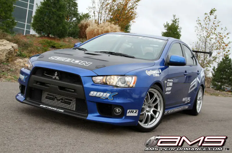 Ams Performance 08-15 Mitsubishi Evo X Front Mount Intercooler W/Modular Cast End Tanks & Logo 1