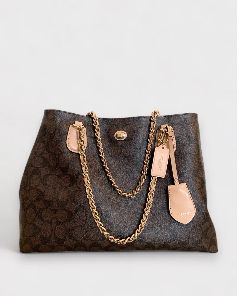 Sac Signature Coach 1
